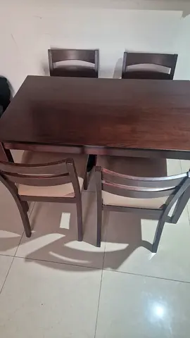 Solid wood dining table with 4 chairs - good condition