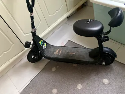 Black Electric Scooter with Seat and Backrest