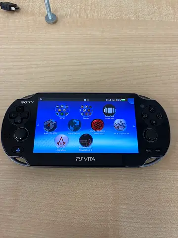 Sony PS Vita handheld console - good condition, working