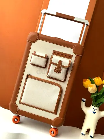 Hermès Fauve Taurillon Regate, Ecru and Beige Canvas R.M.S Cargo Cabin Suitcase Palladium Hardware