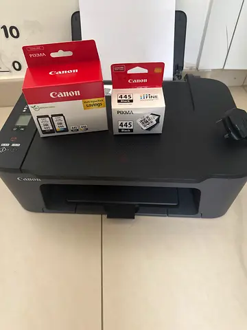 Canon PIXMA compact inkjet printer with extra Canon 445 cartridges (black color)