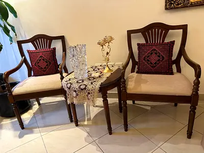 Pair of wooden armchairs with side table - excellent condition