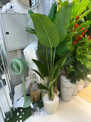 Large artificial potted tropical plant