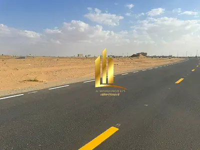 Residential land for sale in Sharjah, Al Mazra'a Al Rahmaniya area, next to the mosque, freehold ownership for Arabs.