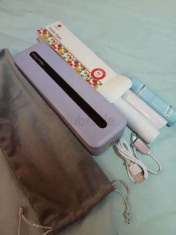 Portable inkless printer/ thermal printer with pouches and USB cable