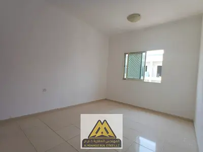 Annual rent: 1-bedroom apartment in Al Rawda 3, separate living room, central AC, closed kitchen, free maintenance by owner, no elevator, AED 25K in 4