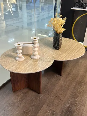 Set of 2 round nesting side tables with wood base and marble-effect tops