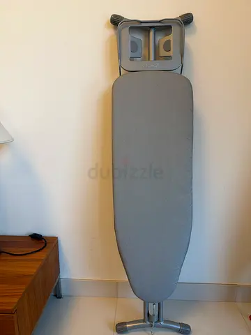 Foldable ironing board with cover - good condition