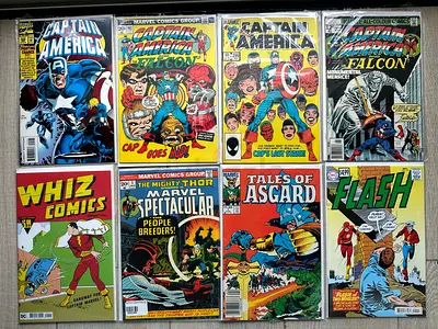 Lot of vintage superhero comic books — Captain America, Flash, Whiz Comics, Tales of Asgard