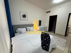 Luxury one-bedroom apartment in Ajman - Al Nuaimiya 1 - Al Shurooq Towers - furnished with hotel-sty