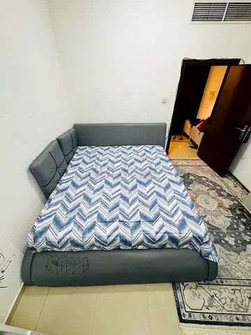 Grey faux-leather double bed frame with headboard and base (used)