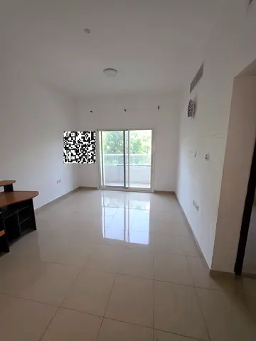 A spacious one-bedroom apartment with a living room for annual rent in Liwa – near the Corniche Ajman
