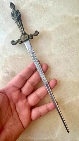 Vintage decorative letter opener with knight figurine handle