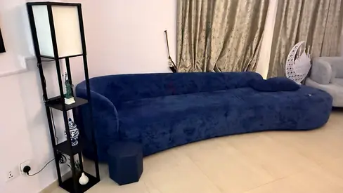 Curved navy blue velvet sofa - modern low-profile 3-seater