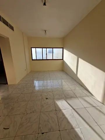 **The Cheapest 2-Bedroom Apartment in Sharjah** Location: Al Bu Tinah * 2 Bedrooms + Living Room * Annual Rent: AED 26,000 * Payment: 4 installments