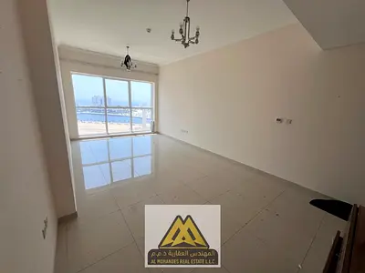 One-bedroom apartment for annual rent in Al Liwara 1, Ajman. Direct sea and marina view, 2 bathrooms, wall cabinets, central AC, free maintenance. Pri