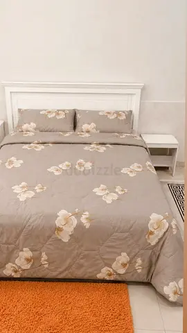 King bed frame with floral bedding  — good condition