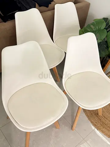 4 white dining chairs