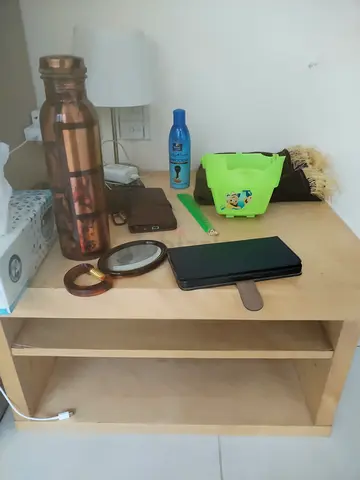 Light wooden bedside table / small shelf with wheels - good condition