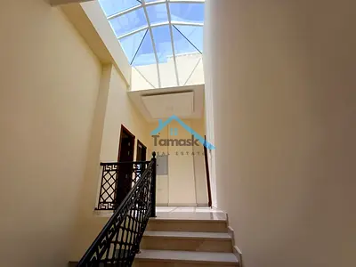 A villa for rent in Mirdif, featuring 4 bedrooms and a practical design spread over two floors. The