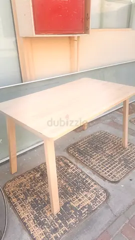 Light wooden dining table - simple, good condition