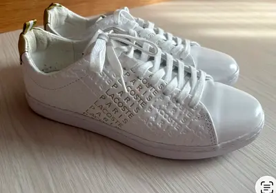 White Lacoste Leather sneakers