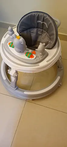 Baby activity walker with interactive music panel - used
