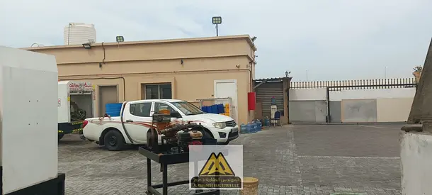 Industrial Property for Sale in Al Jurf Industrial Area 2 Ajman with Showroom Office Open Yard and Rental Income