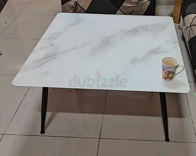 Glass top coffee table for sell