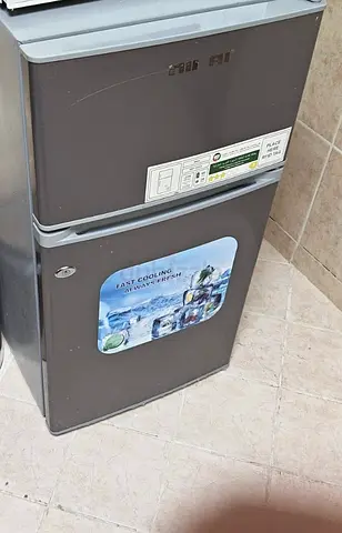 Compact Refrigerator and White Ikon Microwave Oven