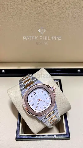 Patek Philippe two-tone mens watch with white dial