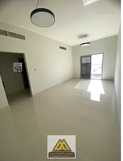 Annual rent: 2-bedroom apartment in Al Jurf 3, spacious layout, balcony, central AC, free maintenanc