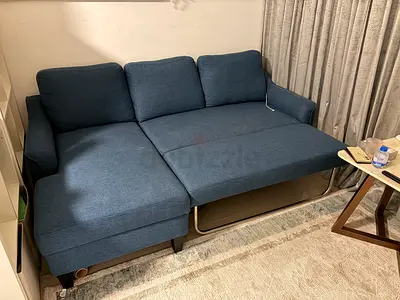 Blue fabric 3-seater sofa bed with chaise, good condition Right-L shaped