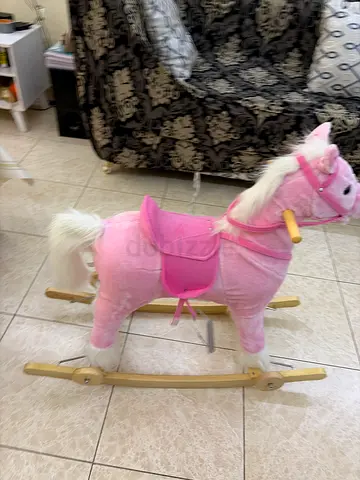Brand new pink horse which has foldable wheels