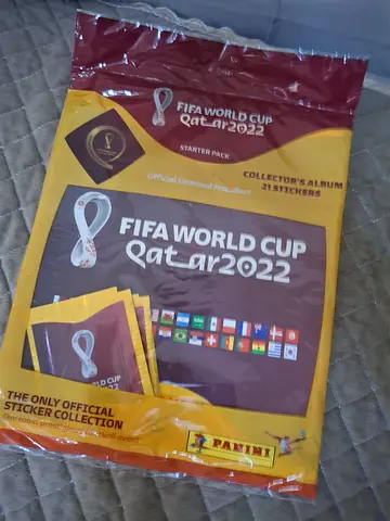Panini fifa world cup 2022 starter pack,contains album and 3 packs