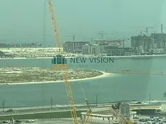 3-bedroom apartment with a living room, featuring an open sea view, a storage room, high-end finishe