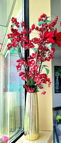 Tall Gold Floor Vase with Red Artificial Blossom Stems