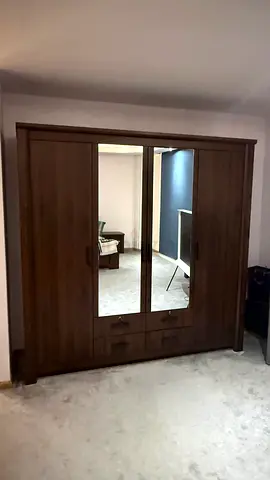 Solid Wood 4-Door Wardrobe with Mirror and Drawers - Good Condition