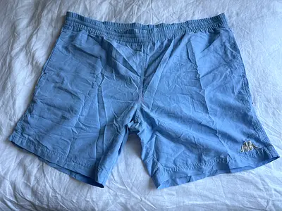 Light blue mens swim trunks / shorts, size L/XL