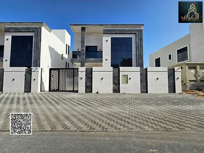 Modern villa for sale in Al Amrah, two floors plus a roof – elegant design and prime location at a negotiable price. Freehold ownership.