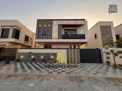 Modern villa for sale with luxurious finishes and high-end modern specifications, including registration fees, in a prime strategic location close to