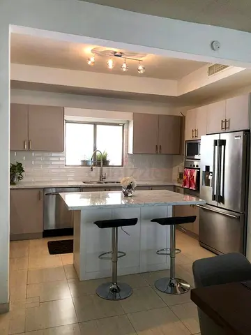 Modern kitchen island with top marble and storage