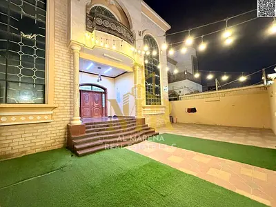 Luxury villa for sale in Al Muwaihat 2, 6 master bedrooms, price includes electricity, water, and air conditioning. Freehold ownership.