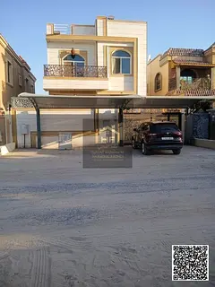 Villa for sale in Ajman. Al Rawda area, consists of two floors, five master bedrooms, a majlis, and