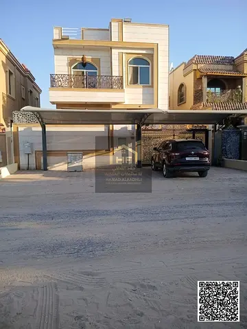 Villa for sale in Ajman. Al Rawda area, consists of two floors, five master bedrooms, a majlis, and a living room. Area: