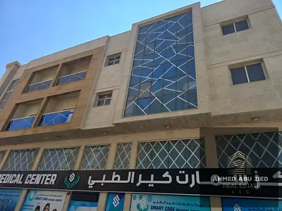 Commercial Investment Building for Sale in Al Alia, Ajman, on a Main Road – Fully leased with an an