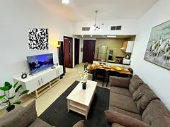 One-bedroom apartment with a living room for rent in City Tower Towers – Ajman, all bills included