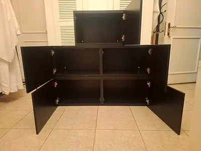 Black multi-compartment storage cabinet with 6 doors