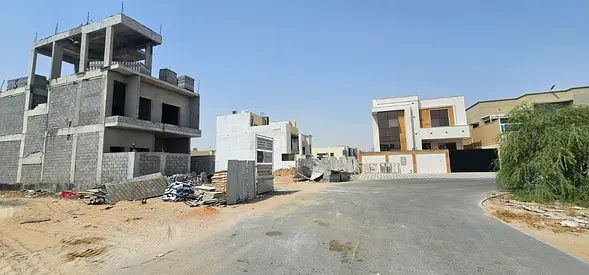 A plot of land for sale in Al Zahiyah area, Ajman, at a bargain price! Building permit ready.