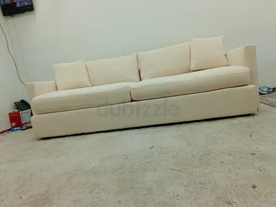 Expensive quality crate and barrel large beige color sofa
